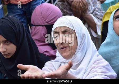 Eid Milad Celebration in Kashmir: A Heartfelt Convergence of Faith and Tradition on September 29, 2023, at Dargah Hazratbal, Srinagar. Amidst the Tranquil Beauty of Dal Lake, Kashmiri Muslims United in Devotion, Seeking a Glimpse of the Sacred Relic of Prophet Muhammad (SAW), Reflecting the Enduring Spirit of Faith and Unity.  Photos by Danish Showkat Stock Photo