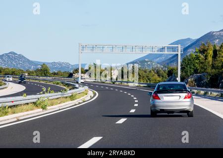 road in Croatia through the mountains. Traveling and relaxing by car Stock Photo