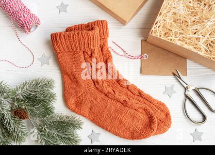 Wool handmade knitted socks,  Christmas gifts. Stock Photo