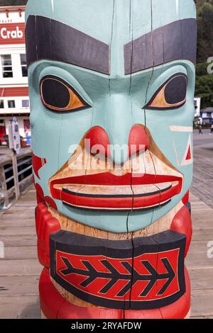 Close up of totem pole in the waterfront area of downtown Juneau, Alaska, USA Stock Photo