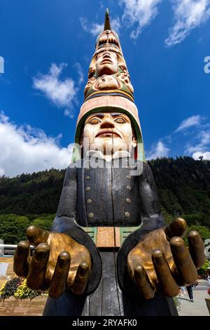 Totem pole in the waterfront area of downtown Juneau, Alaska, USA Stock Photo