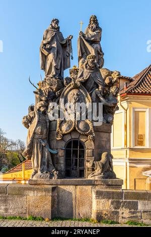 Statue of John of Matha, Felix of Valois and Saint Ivan on Charles Bridge in Prague, Czech Republic Stock Photo