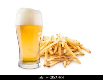 Glass of blonde beer with french fries on white background. Stock Photo
