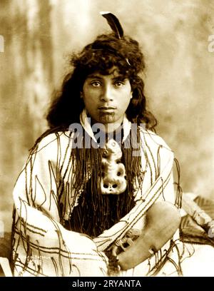 Susan, Rotorua, New Zealand, ca. 1905  Head-and-shoulders portrait of Maori woman from Rotorua, New Zealand (Aotearoa), in traditional clothing, between 1890 and 1920. Sepiatone added. Stock Photo