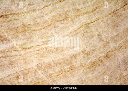 Large format texture, beige quartzite with layered structure, light brown uniform surface Stock Photo