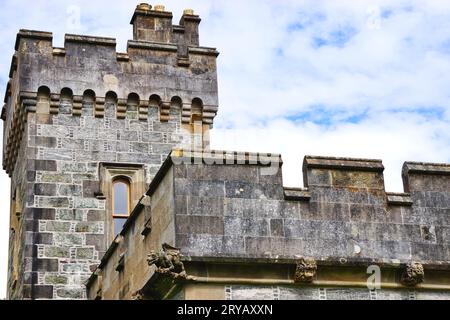 Looking up at the stone battlements of Lews Castle, a mock-Tudor castle build in the mid 1850s in Stornoway, Lewis Island, Outer Hebrides, Scotland. Stock Photo