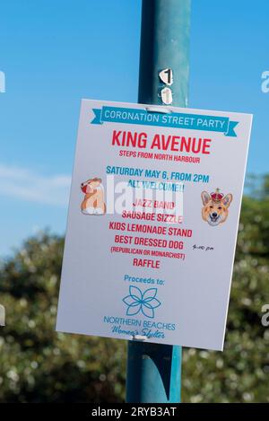 A sign posted on a timber electricity pole, advertising a Coronation Party for King Charles in King Street, Manly, Sydney, Australia Stock Photo