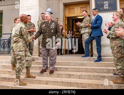 Washington, United States Of America. 28th Sep, 2023. Washington, United States of America. 28 September, 2023. U.S. Army Gen. Mark Milley, chairman of the Joint Chiefs of Staff, center, shakes hands with the incoming Chairman of the Joint Chiefs Air Force Gen. Charles Q. Brown, Jr., left, during the clap-out ceremony as he departs the Pentagon for the last time as chairman, September 28, 2023 in Arlington, Virginia. Brown will succeed Milley as the 21st Chairman of the Joint Chiefs of Staff. Credit: Bernardo Fuller/U.S. Army Photo/Alamy Live News Stock Photo