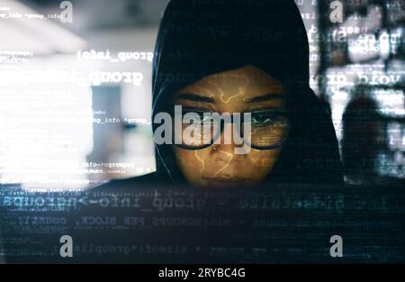 Hacker, woman and laptop with code and hologram, information technology and programming with database. Ransomware, malware or virus, hacking global Stock Photo