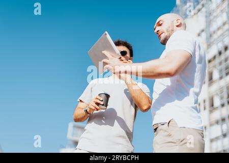 Successful Architects Collaborating on Urban Construction Project Stock Photo