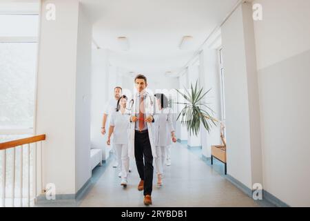 A group of confident doctors in a hospital, providing professional and caring medical services. Stock Photo