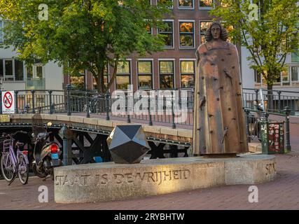 Amsterdam, The Netherlands, 29.09.2023, Statue of philosopher Baruch Spinoza at Zwanenburgwal in Amsterdam Stock Photo