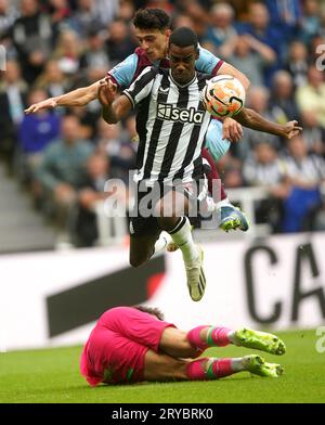 Newcastle United's Alexander Isak attempts to jump over Burnley goalkeeper James Trafford during the Premier League match at St. James' Park, Newcastle. Picture date: Saturday September 30, 2023. Stock Photo
