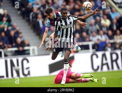 Newcastle United's Alexander Isak attempts to jump over Burnley goalkeeper James Trafford during the Premier League match at St. James' Park, Newcastle. Picture date: Saturday September 30, 2023. Stock Photo