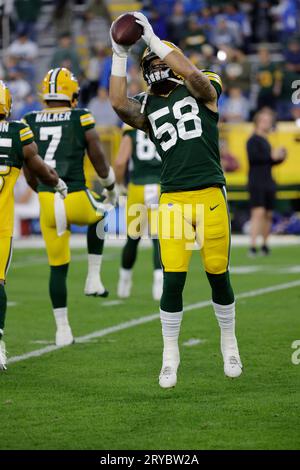 Green Bay Packers linebacker Isaiah McDuffie (58) picks up a loose ball  during an NFL football game against the Washington Commanders, Sunday, October  23, 2022 in Landover. (AP Photo/Daniel Kucin Jr Stock