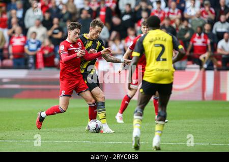 Watford, UK. 30th Sep, 2023. Hayden Hackney #7 of Middlesbrough and Mileta Rajovi? #9 of Watford tussle for the ball during the Sky Bet Championship match Watford vs Middlesbrough at Vicarage Road, Watford, United Kingdom, 30th September 2023 (Photo by Arron Gent/News Images) in Watford, United Kingdom on 9/30/2023. (Photo by Arron Gent/News Images/Sipa USA) Credit: Sipa USA/Alamy Live News Stock Photo