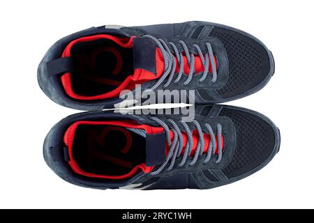 Insulated sneakers with khaki details isolated on white background. Top view. Fashionable stylish sports casual shoes. Mock up for design advertising Stock Photo