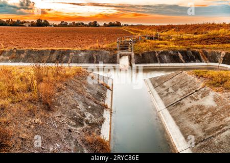 Channel for irrigation of cultivated fields Stock Photo