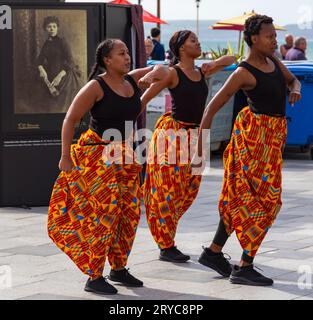 Bournemouth, Dorset, UK. 30th September 2023. Thousands flock to Bournemouth on a warm sunny day for the Arts by the Sea Festival with the theme of Moment, a fun time with quirky theatre, dance and music, providing spectacular shows and inspirational installations for free family entertainment. The Black Victorians dance performance. Credit: Carolyn Jenkins/Alamy Live News Stock Photo