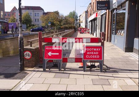 Footpath ahead closed and Pedestrians signs on Crouch Street in Colchester, Essex. Stock Photo