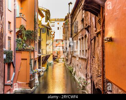 Water canal hidden behind a window in Italy Stock Photo