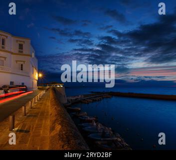 Evening dusk in Gallipoli, province of Lecce, Puglia, southern Italy.  View from walls of Angevine-Aragonese medieval Castle fortress Stock Photo