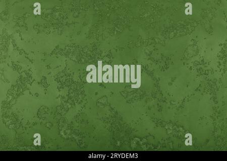 Grunge green painted plaster wall background Stock Photo