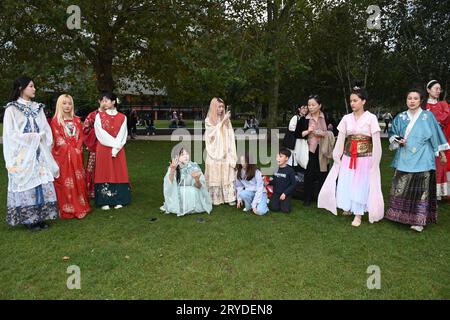 Potter field park, London, UK. 30 September 2023. An immersive performance in Hanfu (汉服) to celebrate the 74th anniversary of the founding of New China (新中国). In order to reflect our sense of ritual for traditional Chinese festivals, Chinese young people proudly performed a large-scale Hanfu (汉服) immersion performance event to showcase traditional Chinese Hanfu. Experience the charm of Chinese traditional culture and let foreign friends feel the rich traditional cultural atmosphere of China. Wearing Hanfu (汉服) is a way to inherit and promote traditional Chinese culture. Stock Photo