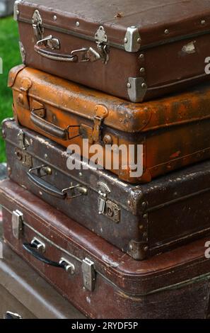 Stack of old vintage travel suitcases close up Stock Photo