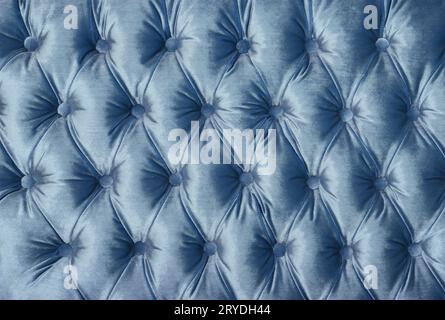 Blue capitone tufted fabric upholstery texture Stock Photo