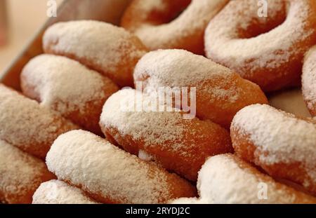 Close up many ring donuts with sugar powder Stock Photo