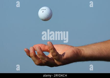Rome, . 30th Sep, 2023. Rome, Italy 30.09.2023: One hand throws the golf ball into the air in FOURBALL MATCHES at RYDER CUP 2023 at Marco Simone Golf & Country Club di Guidonia Montecelio, Roma Credit: Independent Photo Agency/Alamy Live News Stock Photo