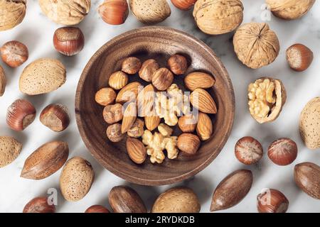 Nuts Mixed in a wooden plate Stock Photo