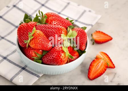 Fresh strawberries in ceramic bowl Stock Photo