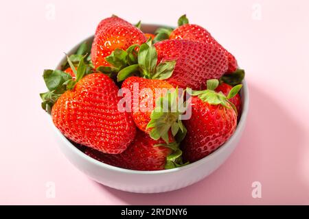Fresh strawberries in ceramic bowl Stock Photo