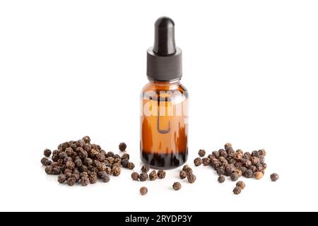 Black pepper essential oil isolated on white background Stock Photo