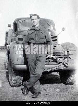 RAF ground crew  and a Dodge truck of 85 Group, 2nd Tactical Air Force. Taken in Melsbroek, Belgium, March 1945. Stock Photo