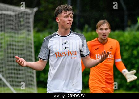 Swansea, Wales. 30 September 2023. Jack Fanning of Swansea City complains to the assistant referee during the Under 18 Professional Development League game between Swansea City and Charlton Athletic at the Swansea City Academy in Swansea, Wales, UK on 30 September 2023. Credit: Duncan Thomas/Majestic Media. Stock Photo