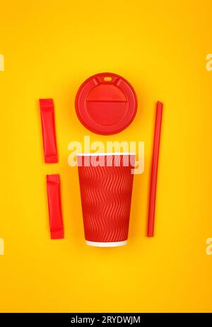 Red paper coffee cup over yellow Stock Photo