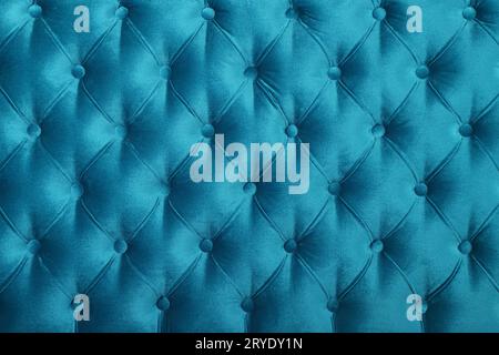 Teal blue capitone tufted fabric upholstery texture Stock Photo