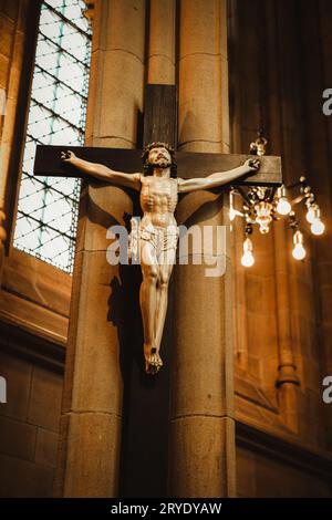 Wakefield, England - May 13, 2023: Cathedral Church of All Saints in Wakefield, Interior view towards the nave, monuments, stained glass windows, benc Stock Photo