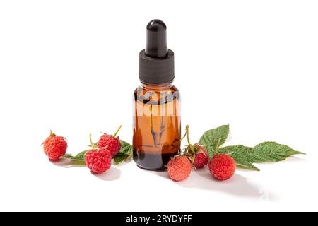 Raspberry essential oil isolated on white background Stock Photo