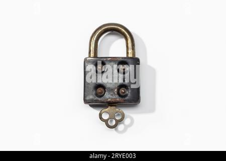 Antique padlock isolated on white background. Closed concept Stock Photo