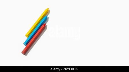 Colored crayons isolated on white background Stock Photo