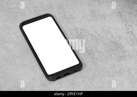 Smart phone with white screen isolated on textured concrete background Stock Photo