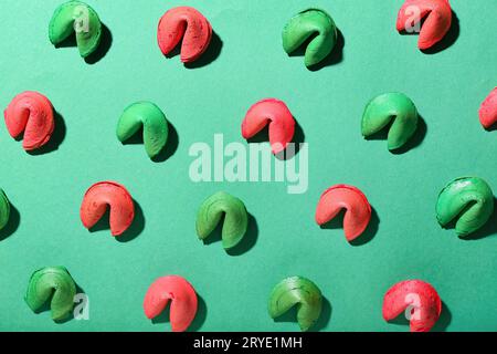 Green and red fortune cookies on color background Stock Photo