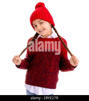 Little girl in winter clothes on white background Stock Photo