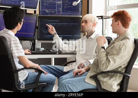 Male programmers working in office Stock Photo
