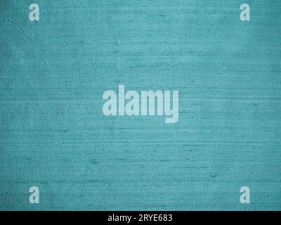 Faded blue dupioni silk fabric laid flat background for texture or text. Stock Photo