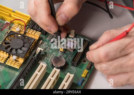 Master repairs chip Stock Photo